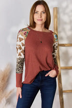 Plus size leopard waffle-knit blouse with brown gingham and floral accents