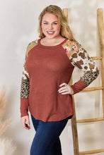 Plus size leopard waffle-knit blouse with animal print sleeves