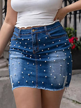 Plus size pearl embellished blue denim skirt with white studs and frayed hem in denim skirt style
