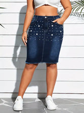 Plus size dark blue denim skirt with pearl embellished frayed hem and white floral and dot details