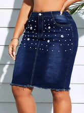 Plus size dark blue denim skirt with pearl embellished frayed hem and white floral and dot embellishments