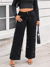 Plus size black wide leg jeans with pearl embellished wide detailing for a stylish and elegant look