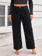 Plus size pearl embellished wide black denim wide leg jeans with white pearl-like studs on sides and front