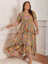 Plus size printed floral tiered maxi dress with puff sleeves and V-neck