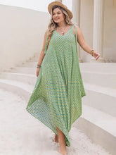 Plus size printed wide leg jumpsuit in light green geometric pattern