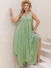 Plus size printed V-neck wide leg jumpsuit in light green geometric pattern