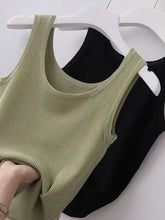 Plus size ribbed knit scoop neck tank tops in soft olive green and black with sleeveless design on white hangers