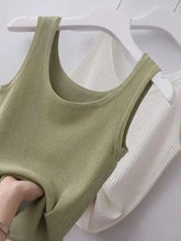 Plus size ribbed knit scoop neck tank top in soft sage green and off white with thin straps on white hangers