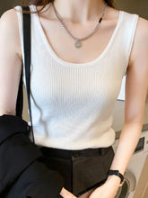 Plus size white ribbed knit scoop neck tank top with sleeveless design for comfortable casual wear