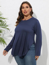 Navy blue plus size round neck long sleeve tunic top with relaxed fit and flared hem