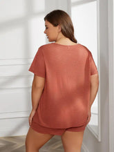Plus size rust-colored soft two-piece loungewear set with short sleeve length and round neck design