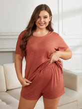 Plus size rust-colored knit two-piece loungewear set with short sleeve length and a comfortable round neck design
