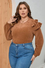 Plus size ruffled round neck long sleeve T-shirt with blue jeans
