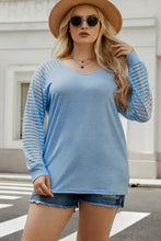 Plus size sheer striped sleeve V-neck top in light blue with straight hem