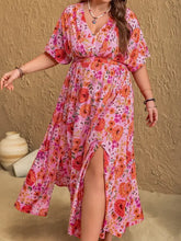 Plus size slit floral maxi dress with V-neck and short flutter sleeves