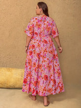 Plus size slit floral maxi dress with V-neck and cinched waist