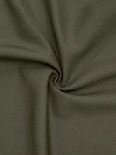 Plus size smocked olive green wide leg jumpsuit fabric