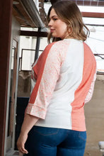 Plus size two tone raglan sleeve top with floral details
