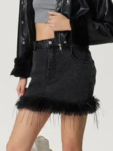 Black denim mini skirt with plush fuzzy feathered hemline featuring soft textured trim and classic mini denim style