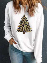 White long-sleeved plush leopard tree sweatshirt with drop shoulder design and slightly stretchy fabric machine wash safe