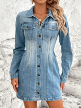 A light-wash long sleeve denim dress with a classic collar, front button closure, and two chest pockets