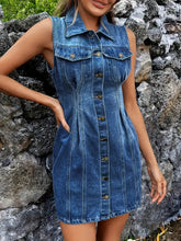 Blue denim sleeveless dress with button front collar and pockets showcasing a stylish sleeveless denim dress design