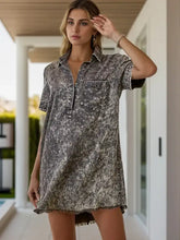 Women wearing a faded gray and black washed pocketed collared neck short sleeve denim dress