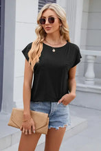 Women’s black pocketed heathered cap sleeve t-shirt with rounded neckline