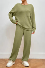 Olive green waffle-knit two-piece loungewear set with pocketed round neck top and long sleeve length pants