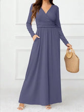 Pocketed surplice long sleeve maxi dress in periwinkle blue