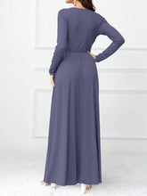 Pocketed surplice long sleeve maxi dress in periwinkle blue