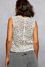 White lace sleeveless cropped crochet vest with intricate floral patterns and scalloped edge from pol button collection