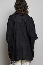 Black linen half dolman sleeve shirt with loose, flowing sleeves and a relaxed fit in the POL button down style