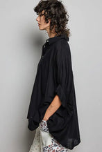 Black POL button down half dolman sleeve shirt with relaxed flowing fabric and rolled cuffs for casual wear