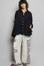 Black half dolman sleeve button-up shirt with ruffled sleeves and relaxed flowing silhouette by pol