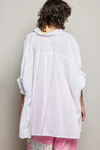 White loose-fitting half dolman sleeve blouse with soft pink gradient hem and subtle stitched paneling