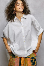 White linen half dolman sleeve button down shirt with rolled sleeves and relaxed fit by pol