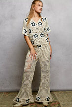 Cream crochet cardigan with POL button front, V-neck, black star motifs