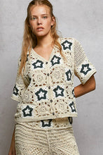 Cream crochet cardigan with black star motifs and POL button front