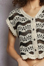 Pol crochet button-down vest in black and cream with scalloped edges and decorative lace crochet button details