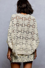 Cream-colored crochet knit lightweight cardigan with floral lace
