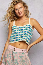 Blue and cream crochet cami crop top with scalloped edge and grid pattern in lightweight cotton yarn design