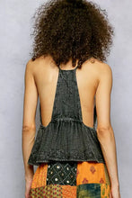 Black textured halter top with peplum and lace trim featuring pol embroidered square neck and adjustable shoulder straps