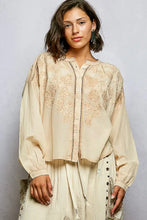 Beige long sleeve washed blouse with delicate floral pol embroidery button detailing and button down front design
