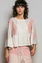 Patchwork top in soft pink white and floral patterns with textured slub knit round neck and ribbed bell sleeves