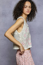 Delicate off-white pol floral embroidered v neck crochet crop top with pink butterfly embroidery and open knit design