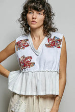 White sleeveless top with colorful floral patch embroidery ruffled hem and raw edge detail from pol floral patch collection