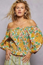 A vibrant yellow and pink pol floral print off-shoulder smocked blouse with puffed sleeves and floral print design