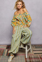 Pol floral print off-shoulder smocked blouse with puffed sleeves in vibrant yellow green and pink floral print