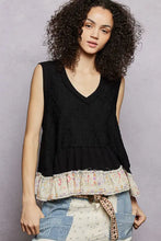 Black sleeveless pol floral print v neck textured tank with tiered hem and floral ruffle detail